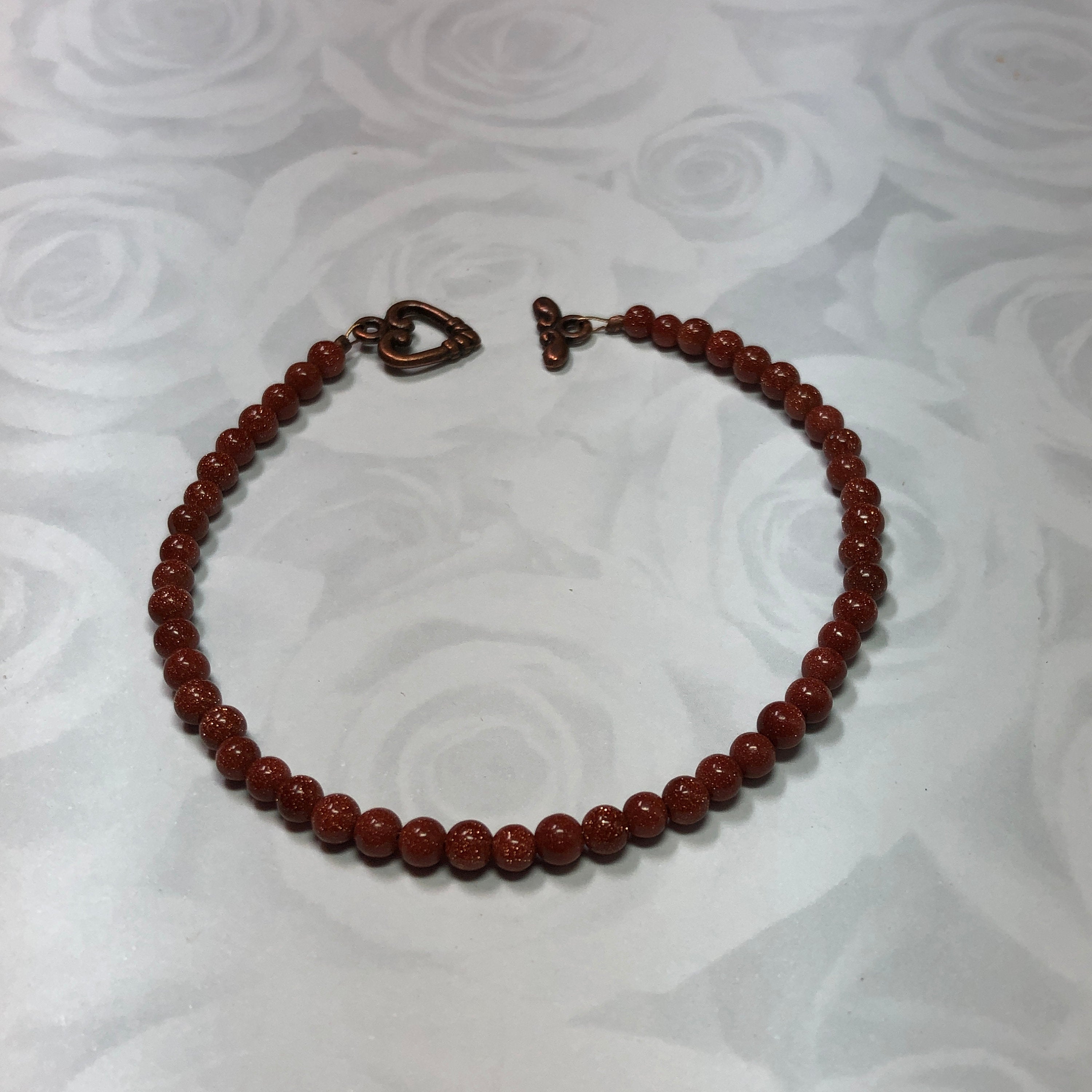 Brown Goldstone Bracelet with Copper Heart Clasp