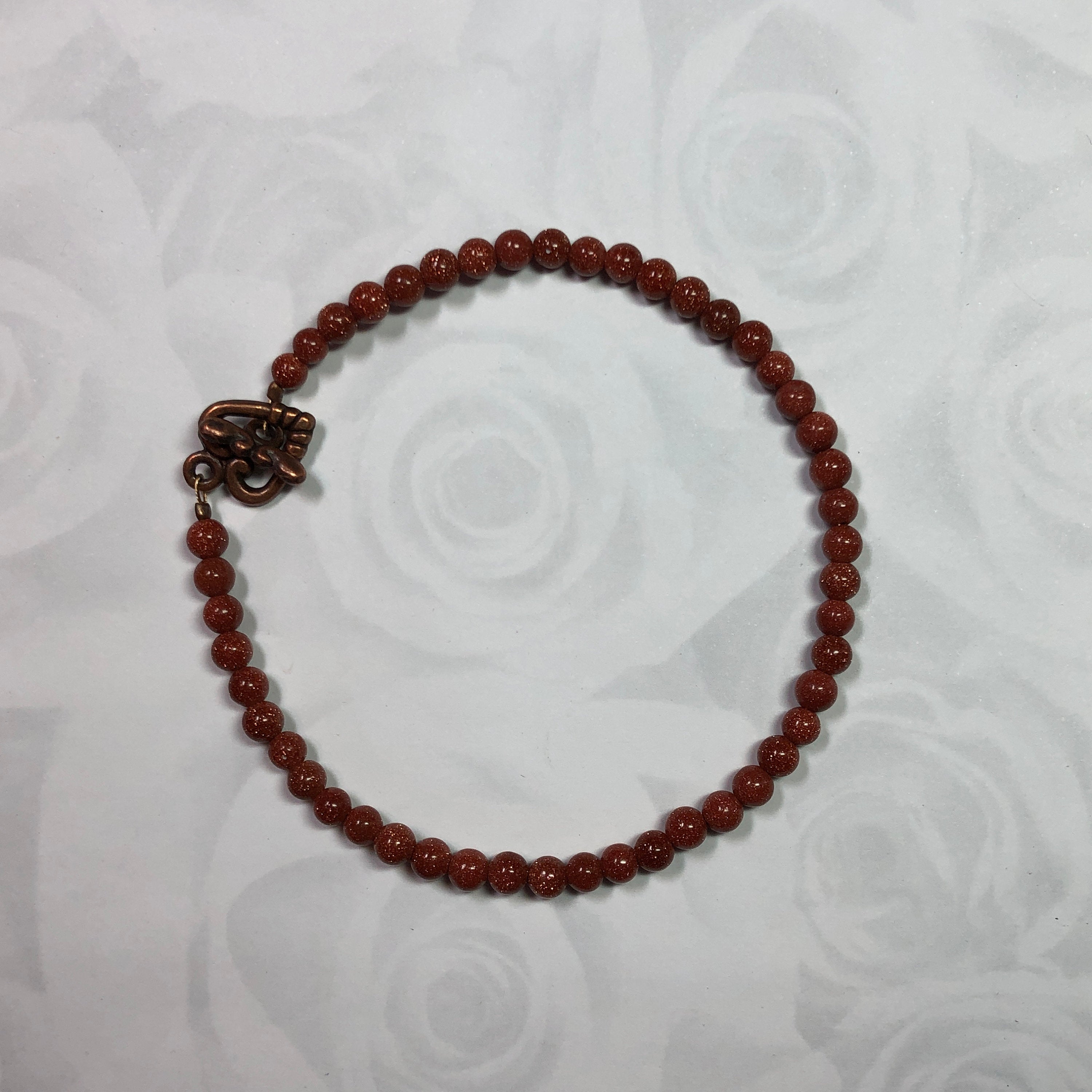 Brown Goldstone Bracelet with Copper Heart Clasp