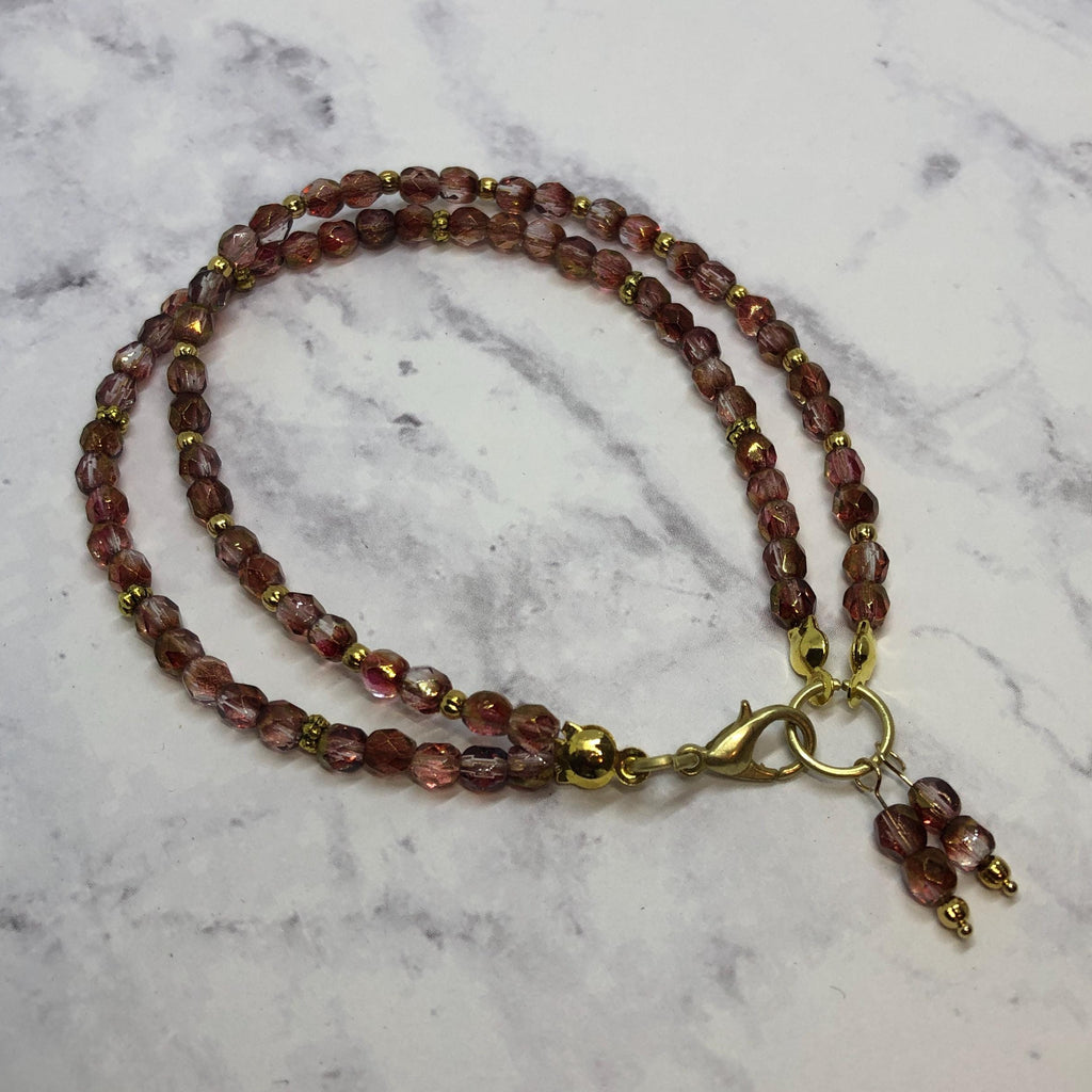 Purple Fire Polished Glass Beaded Bracelet with Gold Accents