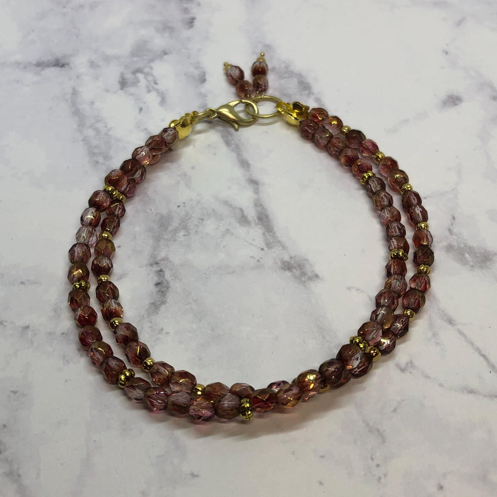 Purple Fire Polished Glass Beaded Bracelet with Gold Accents
