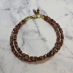 Purple Fire Polished Glass Beaded Bracelet with Gold Accents