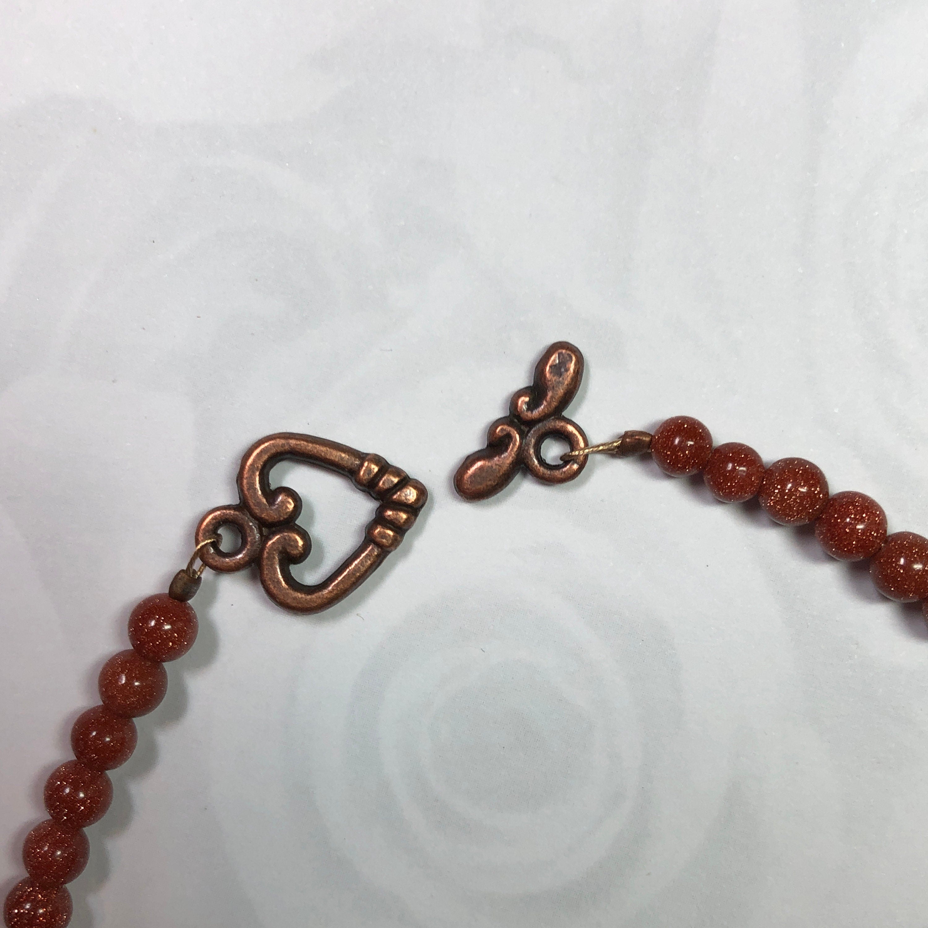 Brown Goldstone Bracelet with Copper Heart Clasp