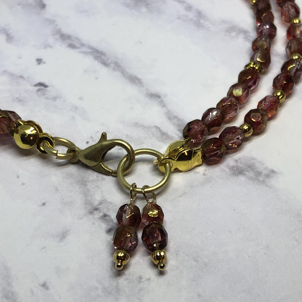 Purple Fire Polished Glass Beaded Bracelet with Gold Accents